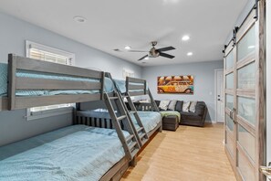 4 bedrooms, desk, iron/ironing board, travel cot