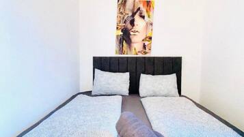 1 bedroom, desk, bed sheets