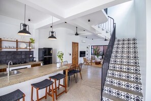 Fridge, microwave, stovetop, coffee/tea maker