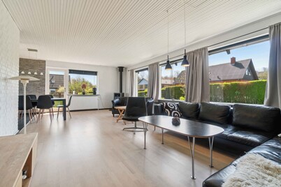 Modern holiday home with sea view in Tejn