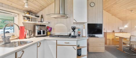 Fridge, stovetop, coffee/tea maker, electric kettle
