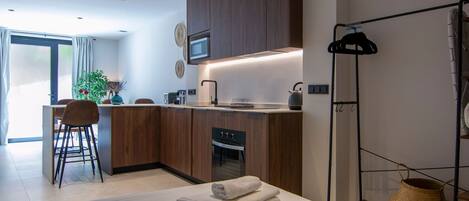 Iron/ironing board, travel crib, free WiFi, bed sheets