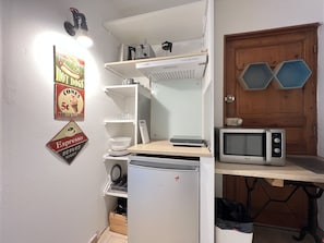 Fridge, microwave, stovetop, coffee/tea maker
