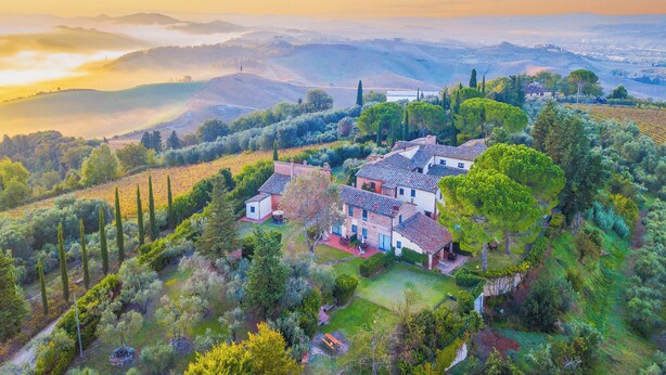 A villa with multiple buildings, surrounded by lush greenery and vineyards, overlooking rolling hills and a valley. - Chianti Site Fienile Shared Pool, Castelfiorentino, Italy (Castelfiorentino)