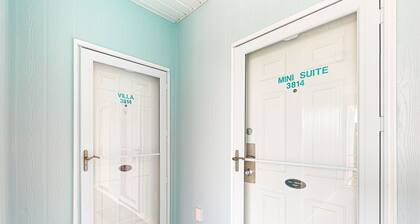 Coastal Suite with golf course view and shared pool access