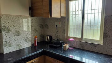 Fridge, coffee/tea maker, electric kettle, toaster