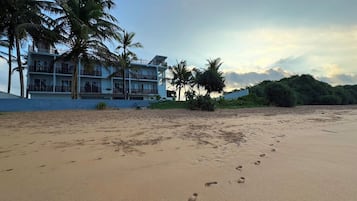 Private beach, sun loungers, beach towels, beach massages