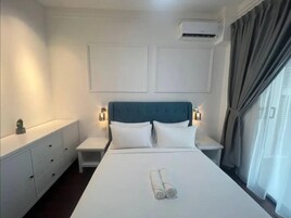 Apartment, 3 Bedrooms, City View | Iron/ironing board, free WiFi