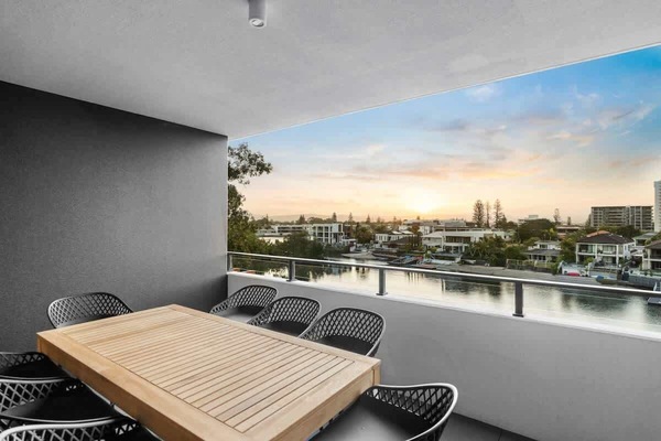 Spacious balcony featuring stylish outdoor seating—perfect for unwinding in the fresh air.