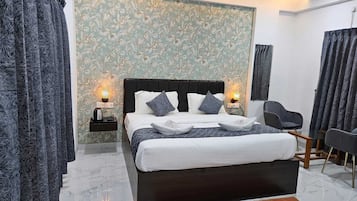 Deluxe Room, Pool View | Free WiFi, bed sheets