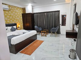 Quarto executivo | Wi-Fi de cortesia, roupa de cama