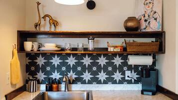 Microwave, coffee/tea maker, toaster, cookware/dishes/utensils