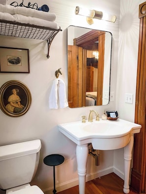 Shower, hair dryer, towels, shampoo
