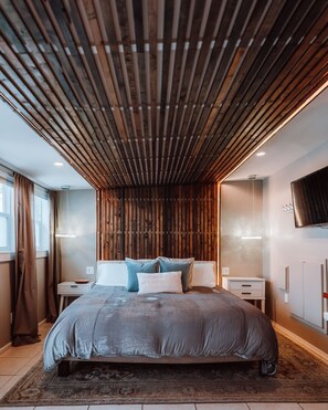 Tabla de planchar con plancha, cuna de viaje, wifi y ropa de cama 