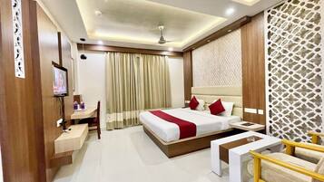 Premium bedding, desk, laptop workspace, soundproofing