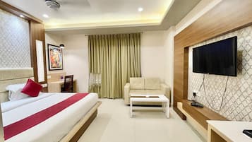 Premium bedding, desk, laptop workspace, soundproofing