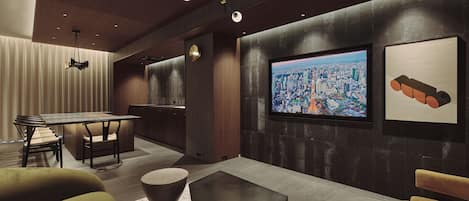 Superior Studio Suite | Living area | 60-inch Smart TV with digital channels, streaming services