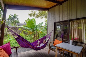 Economy House, Garden View | Terrace/patio - Muri Lagoon Lodge (Rarotonga)