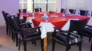 A conference room with a long table, chairs, and water bottles. - Hotel Grand Royal Dhanmondi  (Dhaka)