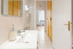 Hair dryer, bidet, towels, soap