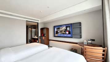 Free minibar, in-room safe, individually decorated, desk