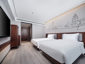 Luxe kamer, 2 eenpersoonsbedden | Een kluis op de kamer, gratis wifi