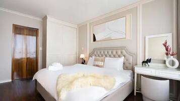 Family Apartment, Balcony, City View | In-room safe, desk, laptop workspace, blackout drapes