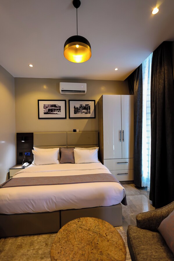 Deluxe Room | 1 bedroom, desk, laptop workspace, free WiFi