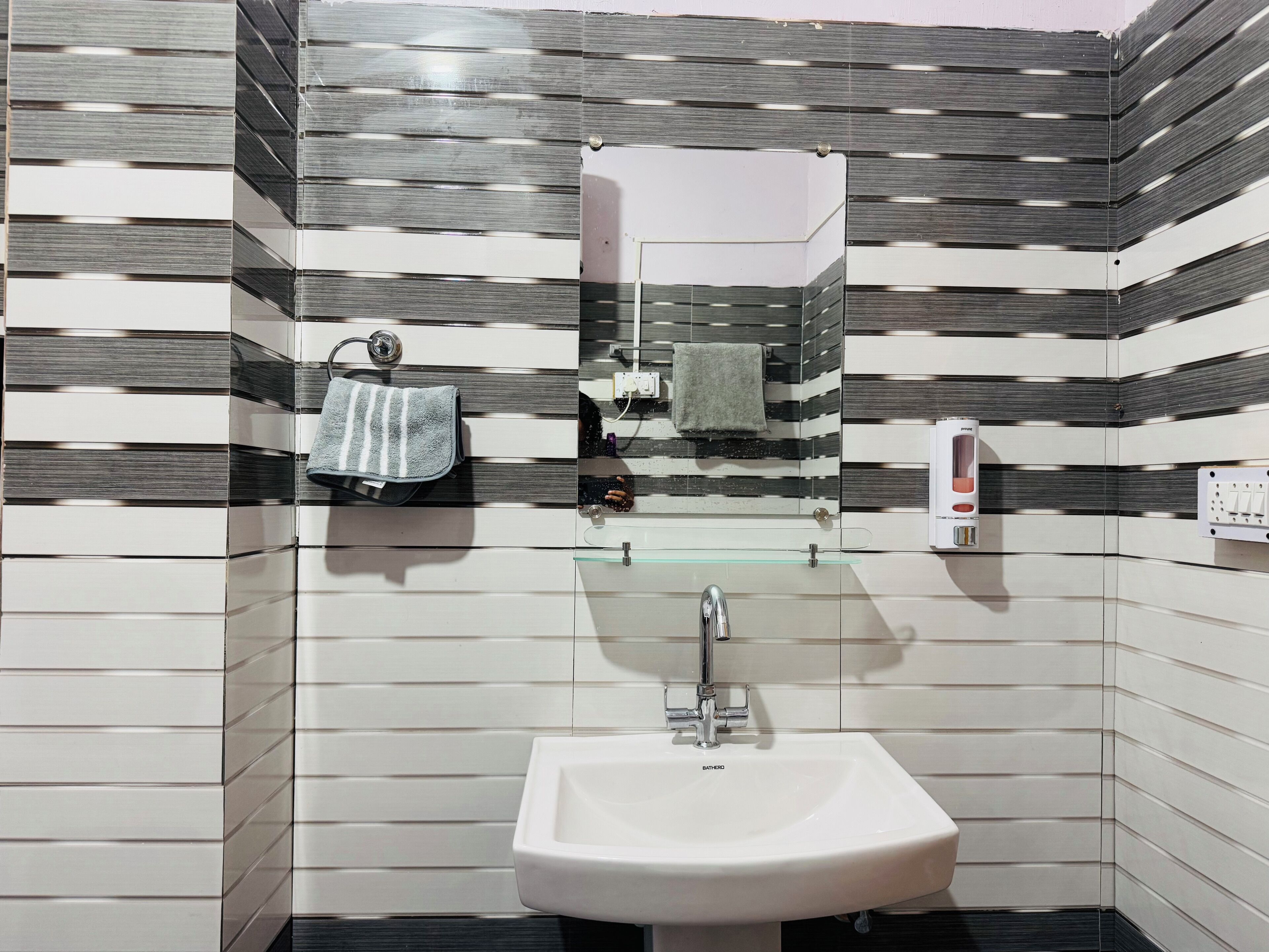 Family Quadruple Room, Courtyard View | Bathroom | Shower, slippers, towels, soap