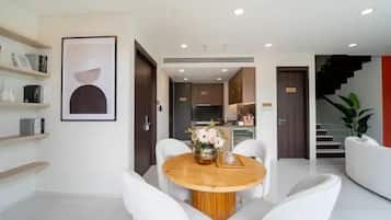 Family Apartment, Balcony, City View | In-room dining