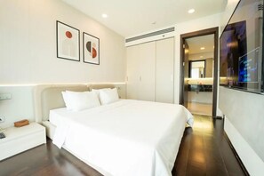 Family Apartment, Balcony, City View | In-room safe, desk, laptop workspace, blackout drapes