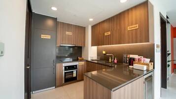 Family Apartment, Balcony, City View | Private kitchen | Fridge, stovetop, cookware/dishes/utensils