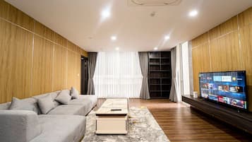 Deluxe Apartment | Living area