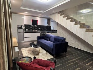 Family Apartment, Balcony, City View | Living area - Castle Estate Apartments (Abuja)