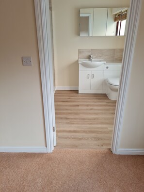 Shower, towels, soap, toilet paper