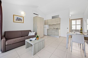 Studio, Balcony | Living area | 32-inch Smart TV with cable channels - Residence Kamenjak Runke (Medulin)