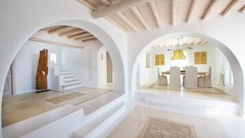 TOPOS MYKONOS OCYRHOE VILLA | Living area | TV