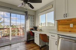 Fridge, microwave, oven, stovetop - Welcome to our 5 bedroom 2 bathroom home in Charming Palmer Lake (Palmer Lake)