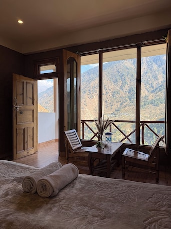 Deluxe Double Room, Patio, Mountain View | Desk, laptop workspace, free WiFi, bed sheets. The VOID - Tirthan Valley