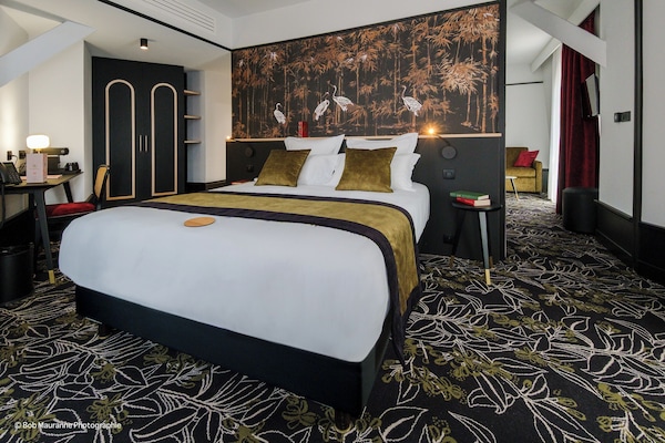 Premium bedding, pillow-top beds, minibar, in-room safe