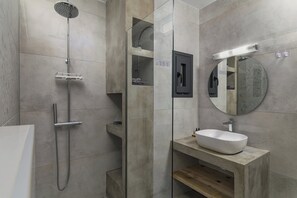 Shower, hair dryer, slippers, towels
