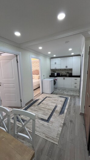 Deluxe-svíta | Stofa | Sjónvarp