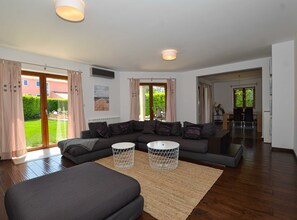 Villa (Four Bedroom Villa with Pool) | Living room | 32-inch flat-screen TV with satellite channels