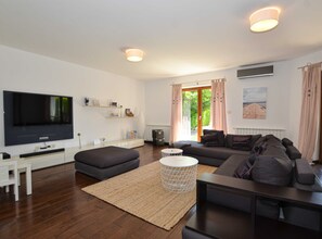 Villa (Four Bedroom Villa with Pool) | Living room | 32-inch flat-screen TV with satellite channels