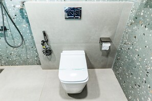 Shower, slippers, towels, soap