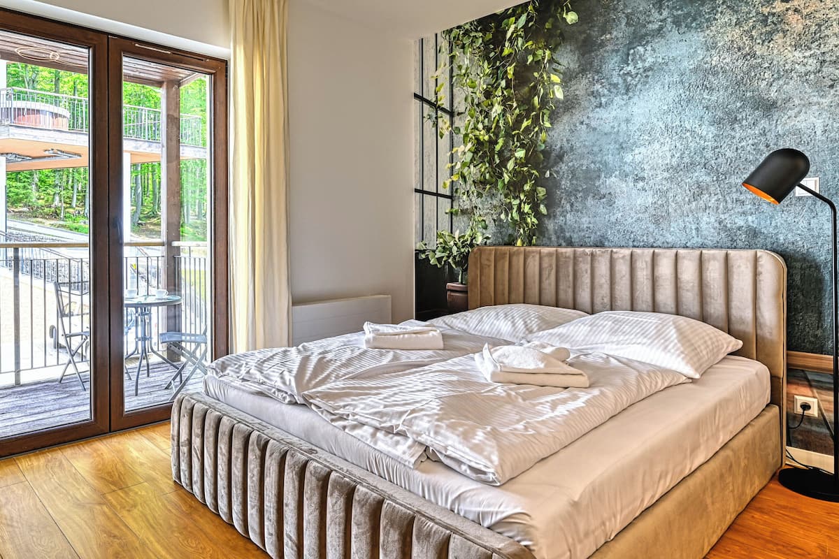 Appartement (215) | Woonruimte | Flatscreentelevisie