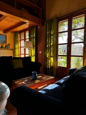 Apartment, Partial Sea View | Living area | Fireplace, table tennis, books - Relais San Damian (Imperia)