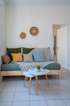 Basic Apartment, 1 Bedroom | Living area | 33-inch Smart TV with digital channels, Netflix, streaming services - The Garden of Zephyrus - Halepa (Chania)