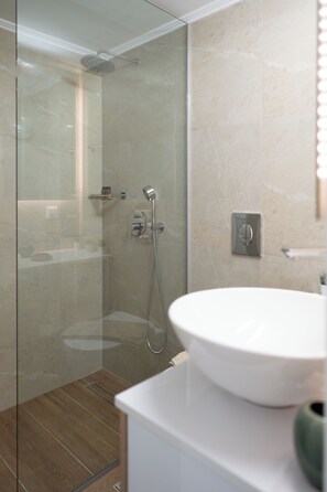 Basic Apartment, 1 Bedroom | Bathroom | Shower, rainfall showerhead, free toiletries, hair dryer