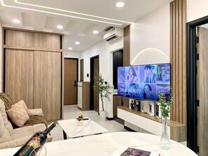 Appartement Deluxe, 2 chambres, vue ville | Coin séjour